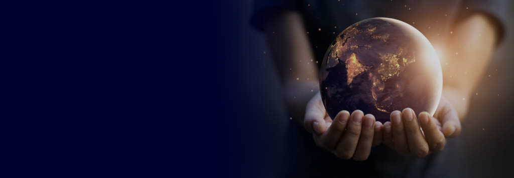 A miniature earth held in human hands, symbolizing care and support for our planet.